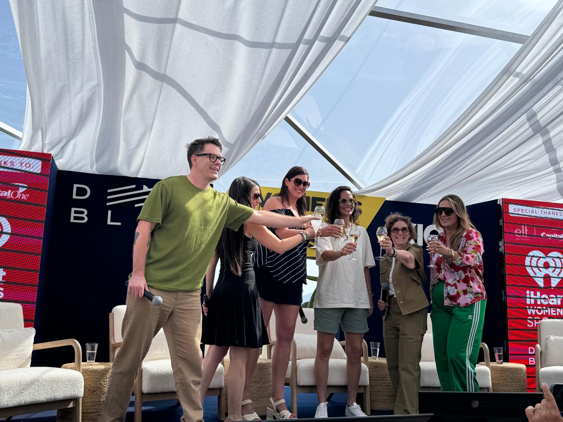 Bobby Bones, Kory Marchisotto, Sue Bird, Gayle Troberman and Laura Correnti toast the launch of iHeartMedia's new Women's Sports Audio Network.