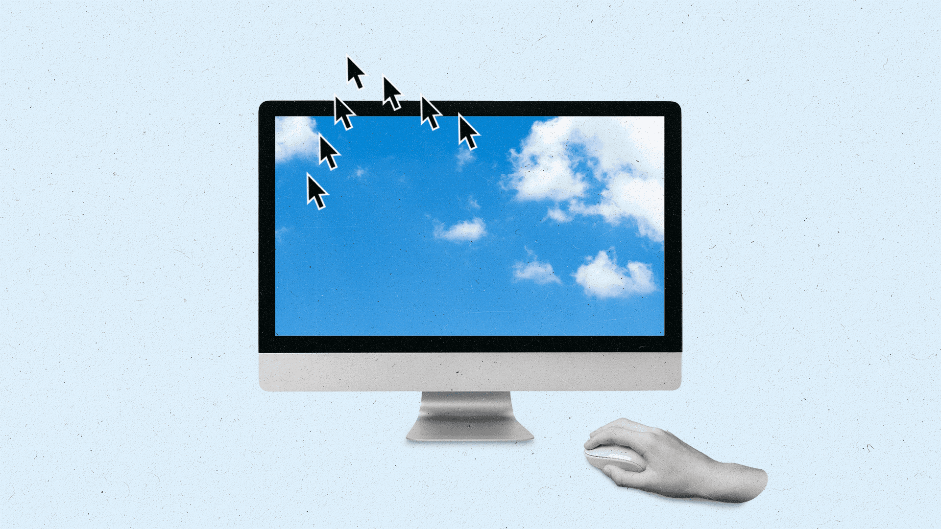 Hand moving a mouse next to a computer monitor showing cursors flying off screen in a 'v' formation.