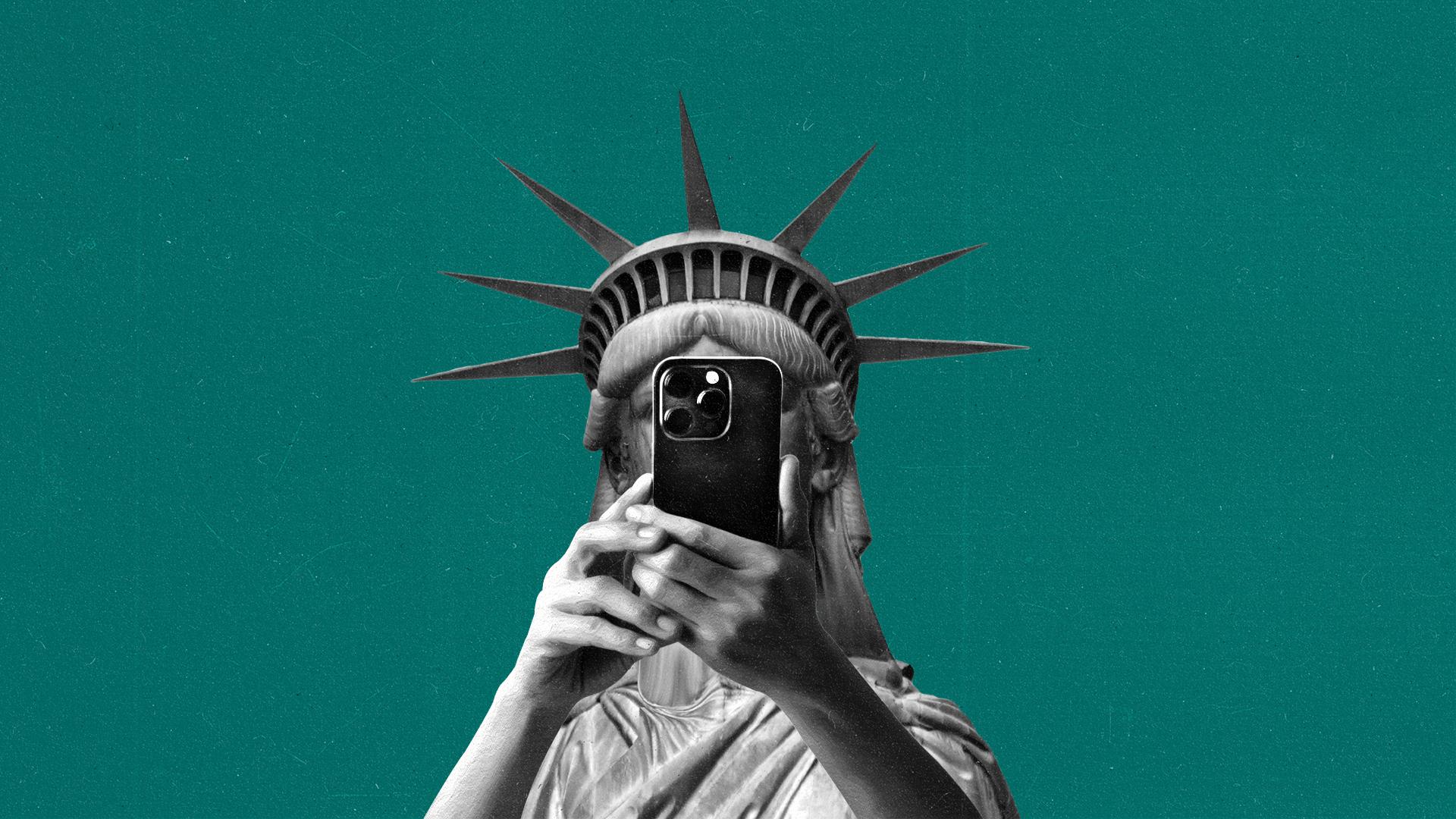 The statue of liberty takes a mirror selfie obscuring its face.