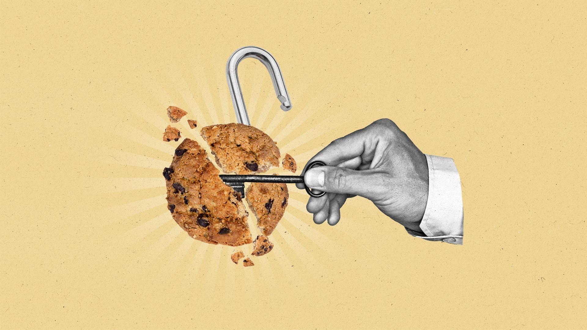 A hand uses a key to unlock a crumbling cookie.