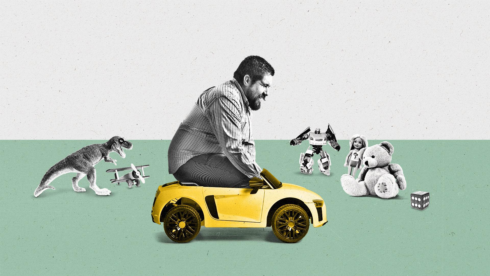 Large adult man riding in a small toy car with various toys laying around