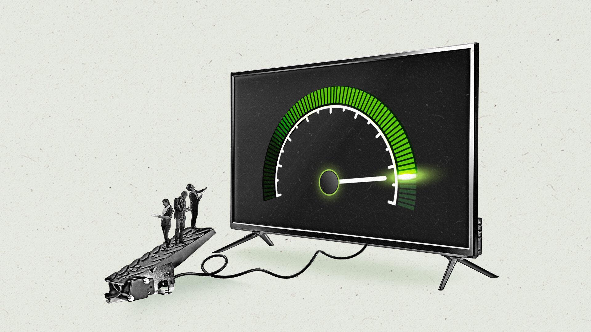 Three people looking at devices stand on a pedal which is controlling a speedometer on a connected TV.