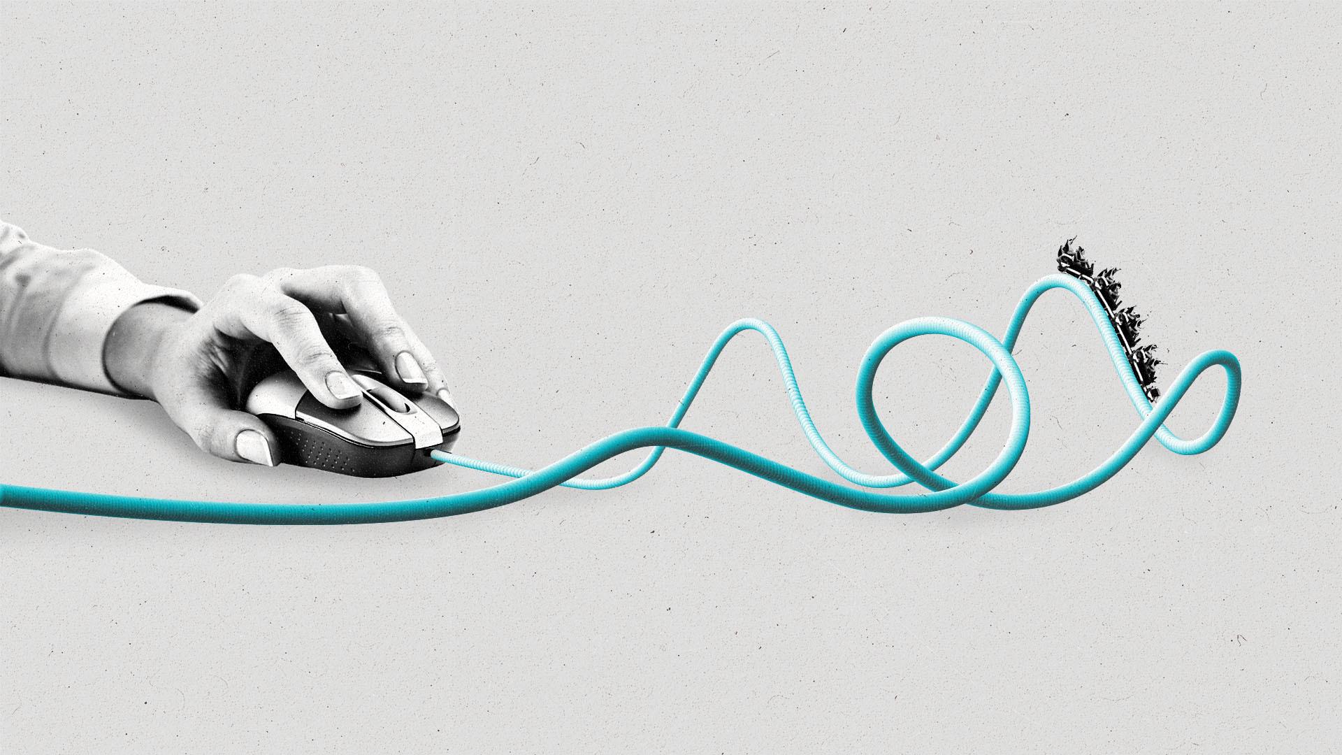 A hand manipulating a computer mouse, its cord undulates in the shape of a roller coaster track with a tiny roller coaster train.