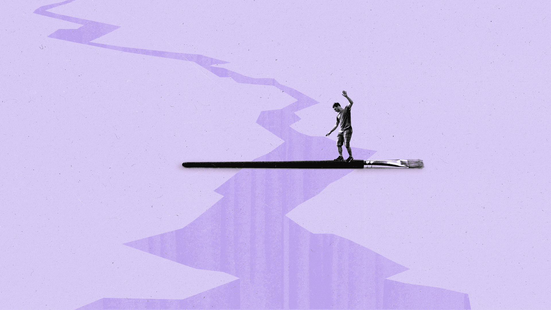 Man balances on a paint brush over an opening in the ground.