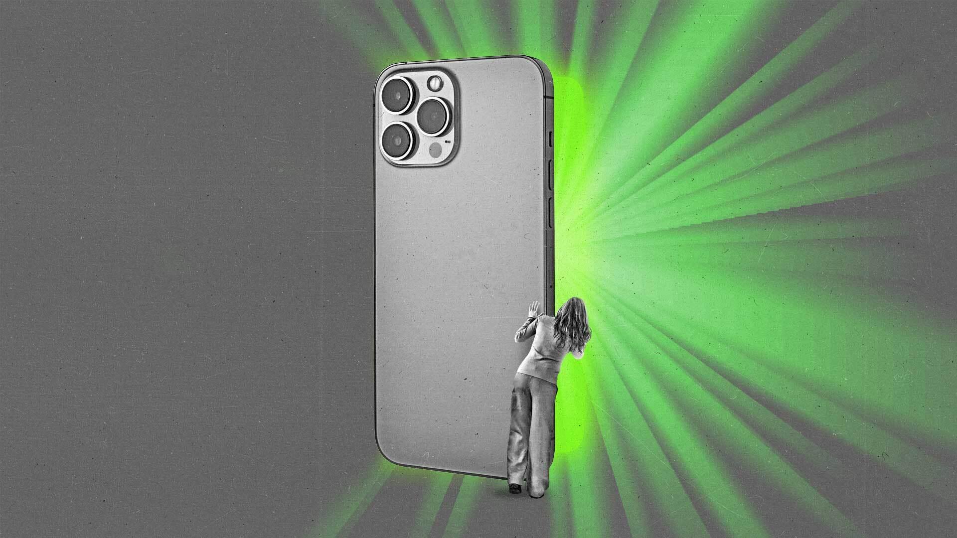 A woman peers around a smartphone that's slightly opened like a door as light streams out from the other side.