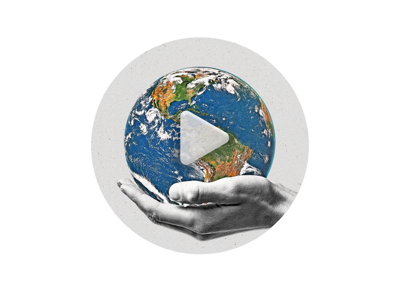 A hand holds a globe with a play button.